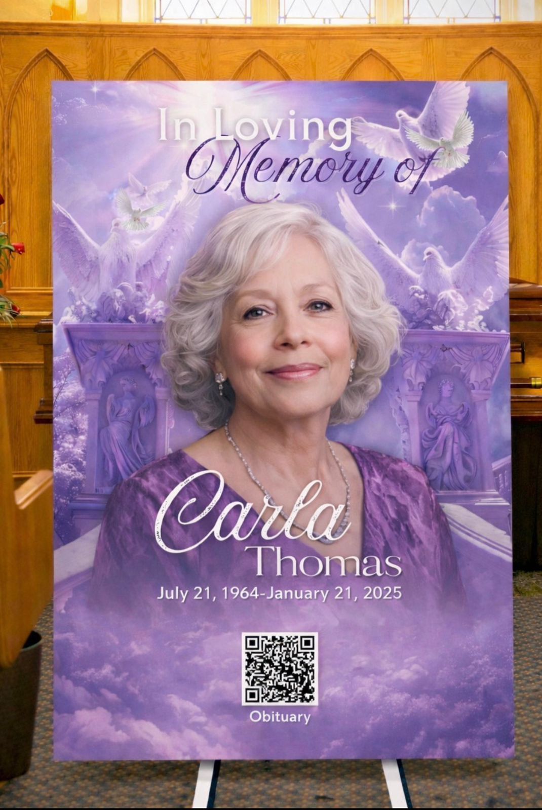 QR Obituary card held in hand showing memorial page